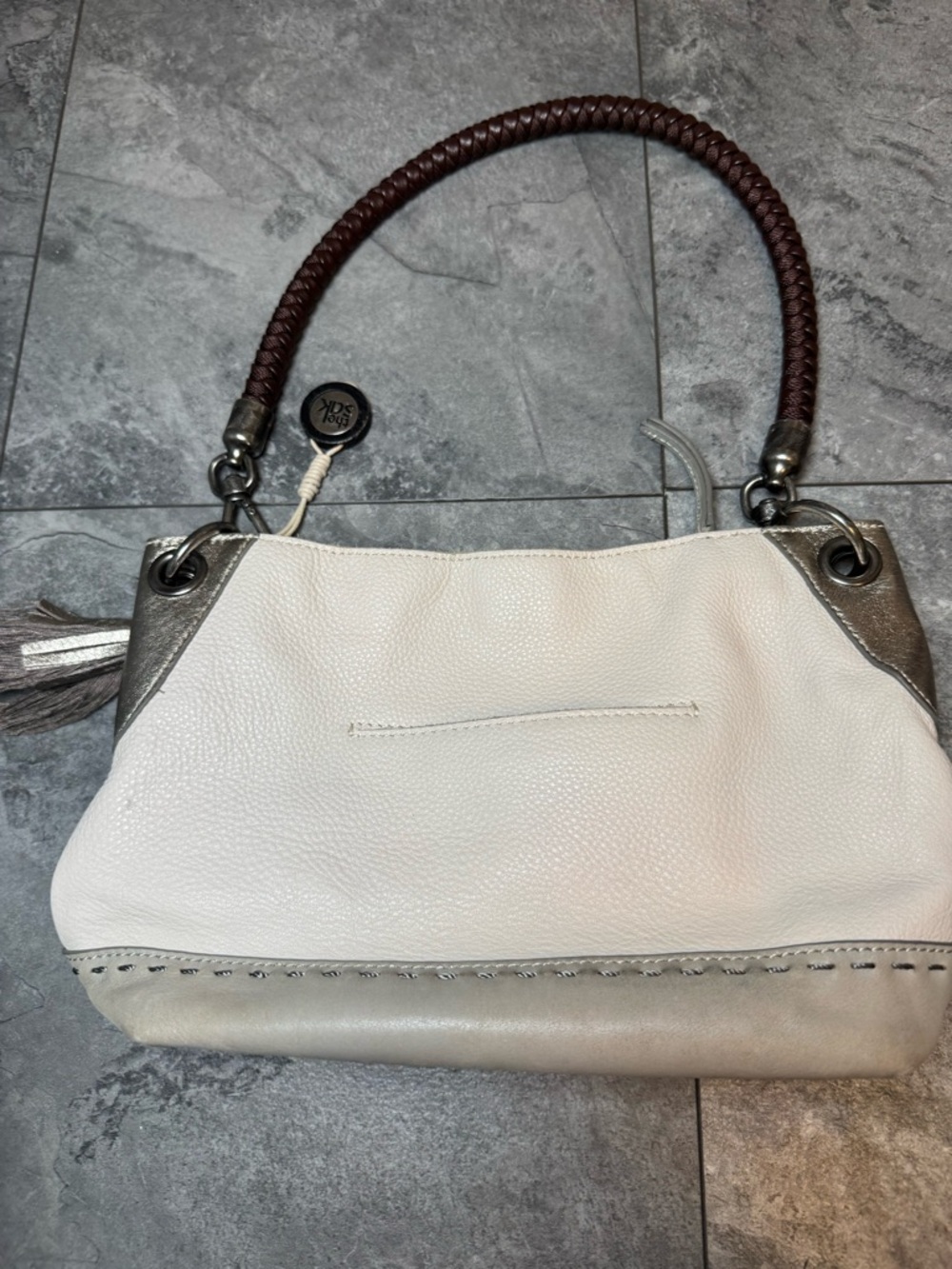 The Sak White and Brown Leather Shoulder Bag with Silver Accents